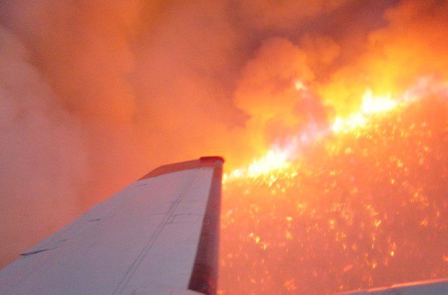 Fire as seen from a lead plane during aerial firefighting mission