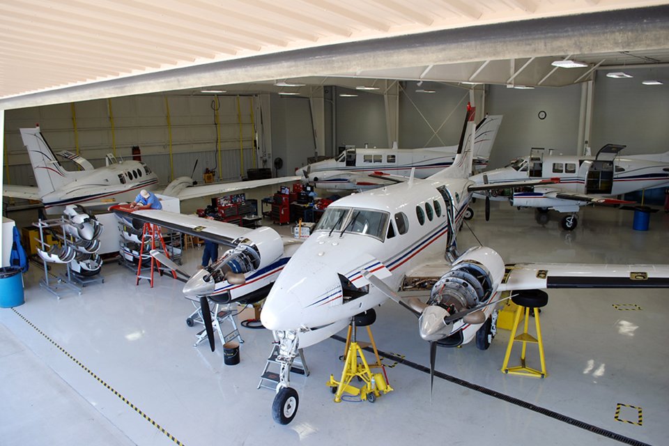Four Beechcraft King Airs in hangar