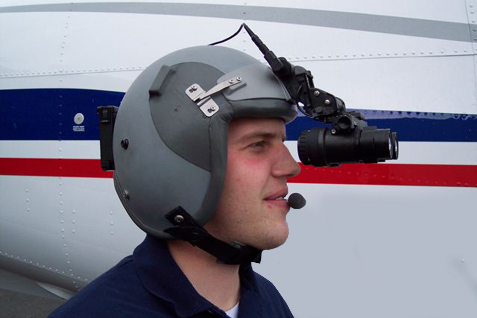 Pilot wearing night vision goggles