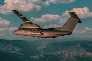 DeHavilland Dash 8 high over desert mountains