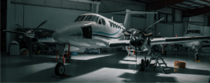 Moody photo of a King Air 200 in the hangar