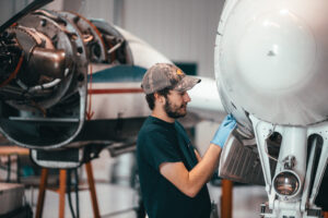 A&P mechanic working on King Air 90