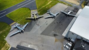 Four DC-3 / C-47 variants parked at Dynamic Aviation