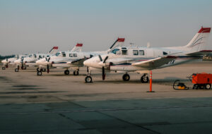line of King Air 90s on the ramp